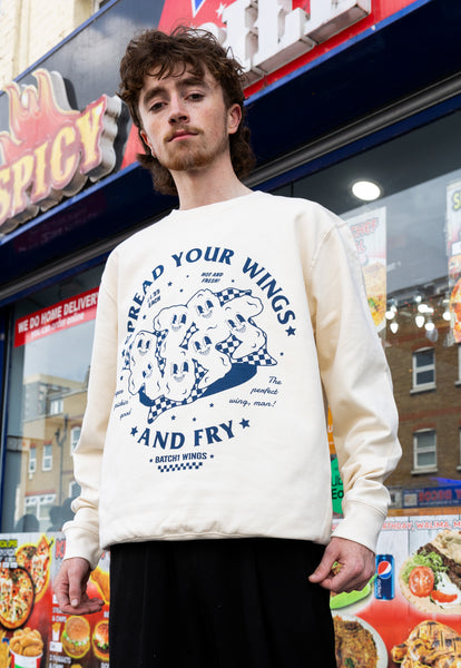 close up shoot of spread your wings and fry up printed jumper