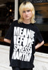 female model wears unisex black t shirt with espresso martini slogan in white print