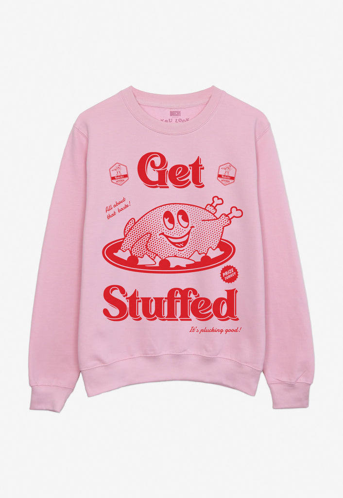 Pink Christmas jumper with funny turkey mascot and get stuffed slogan in red print
