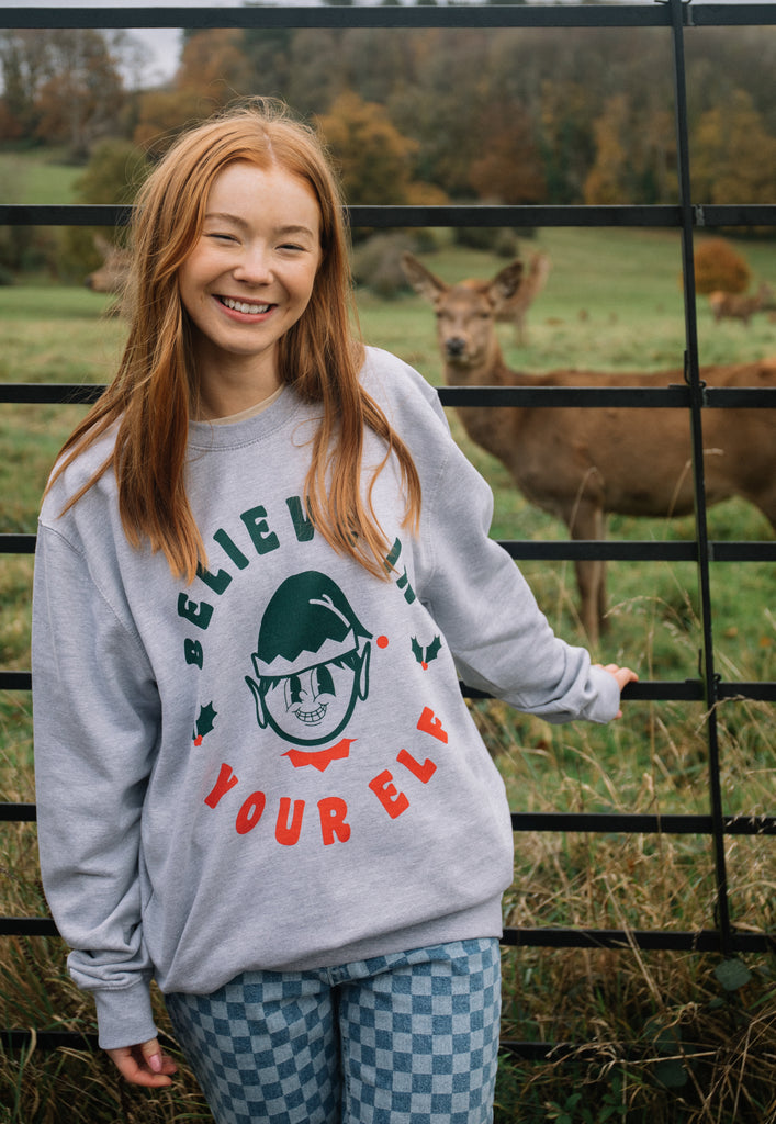 womens christmas jumper with elf slogan print