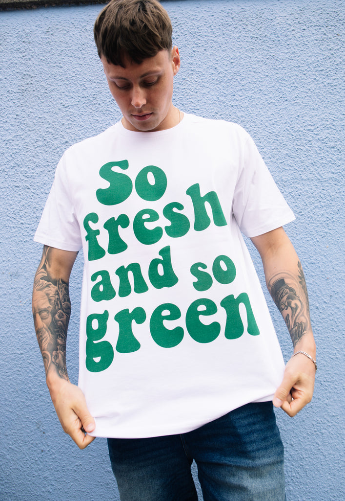 Model wears white tshirt with so fresh and so green slogan