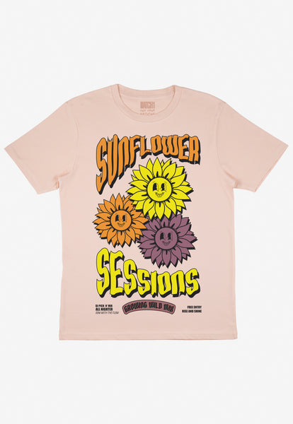 Flat lay of women's dusty peach summer festival t-shirt with floral graphic and slogan
