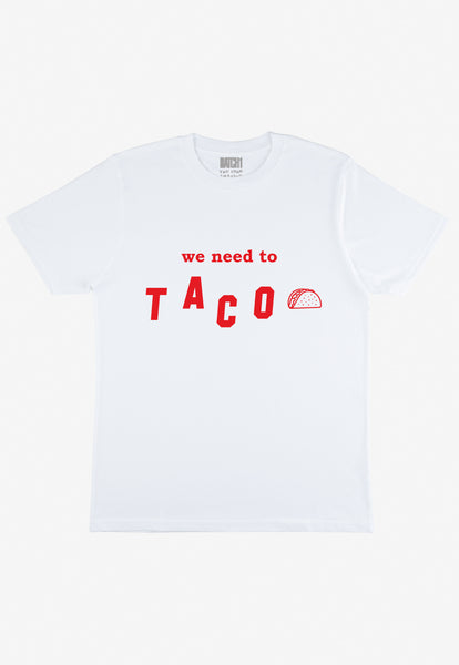Flatlay of white tshirt with We Need To Taco slogan and taco graphic 