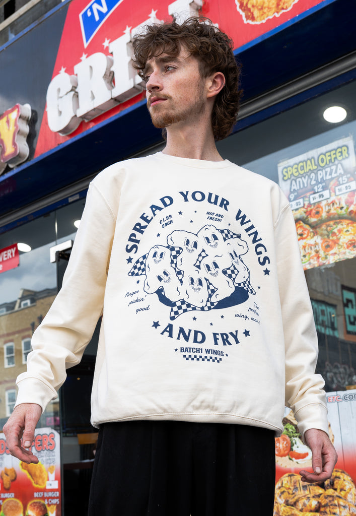 Model wearing spread your wings and fry chicken wings character printed jumper