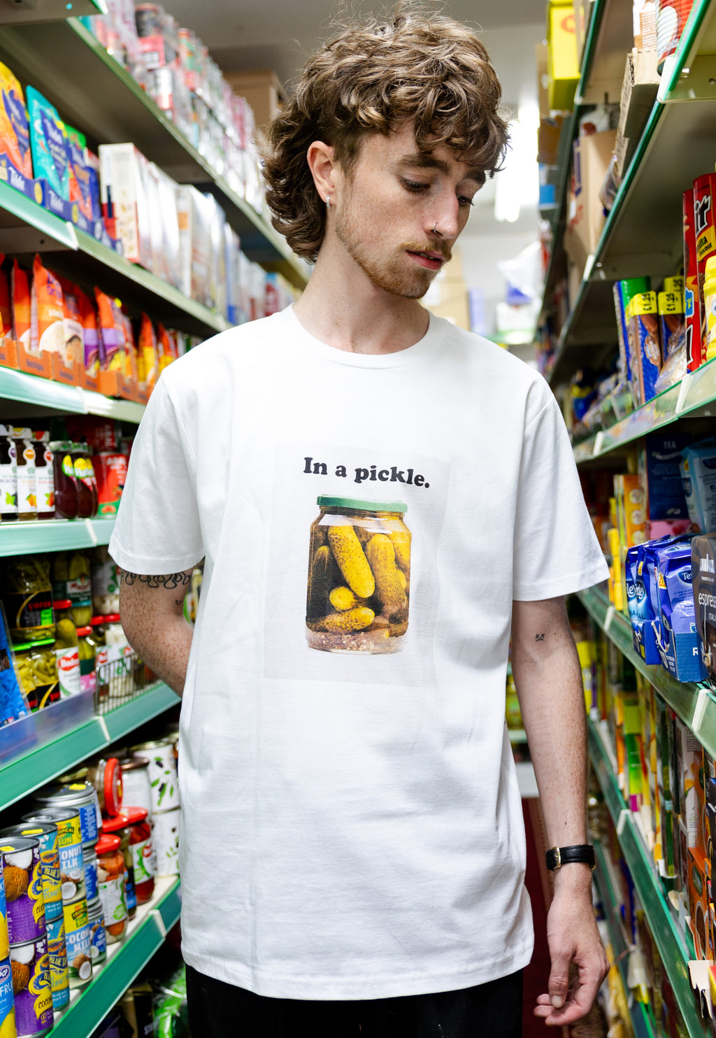 model is wearing pickle jar photo print tshirt in white