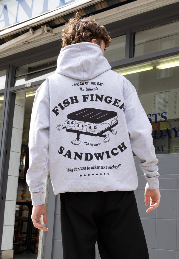 Model wears large back vintage style printed hoodie in grey