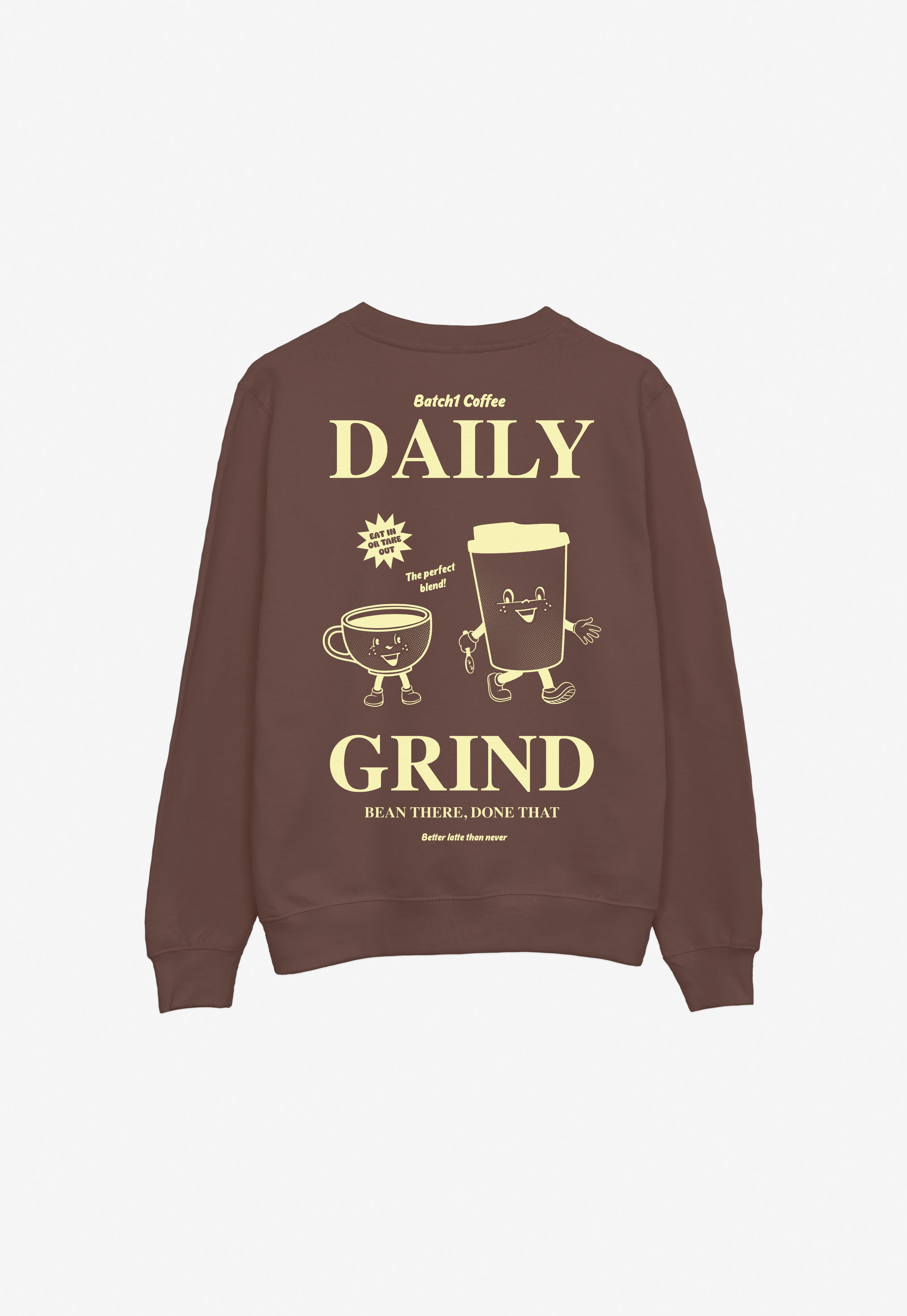 Brown sweatshirt with 'Daily Grind' graphic and text on a white background
