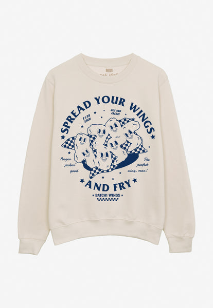 Flatlay of spread your wings and fry slogan graphic print sweatshirt in vanilla