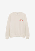 Beige sweatshirt with a red graphic on a white background