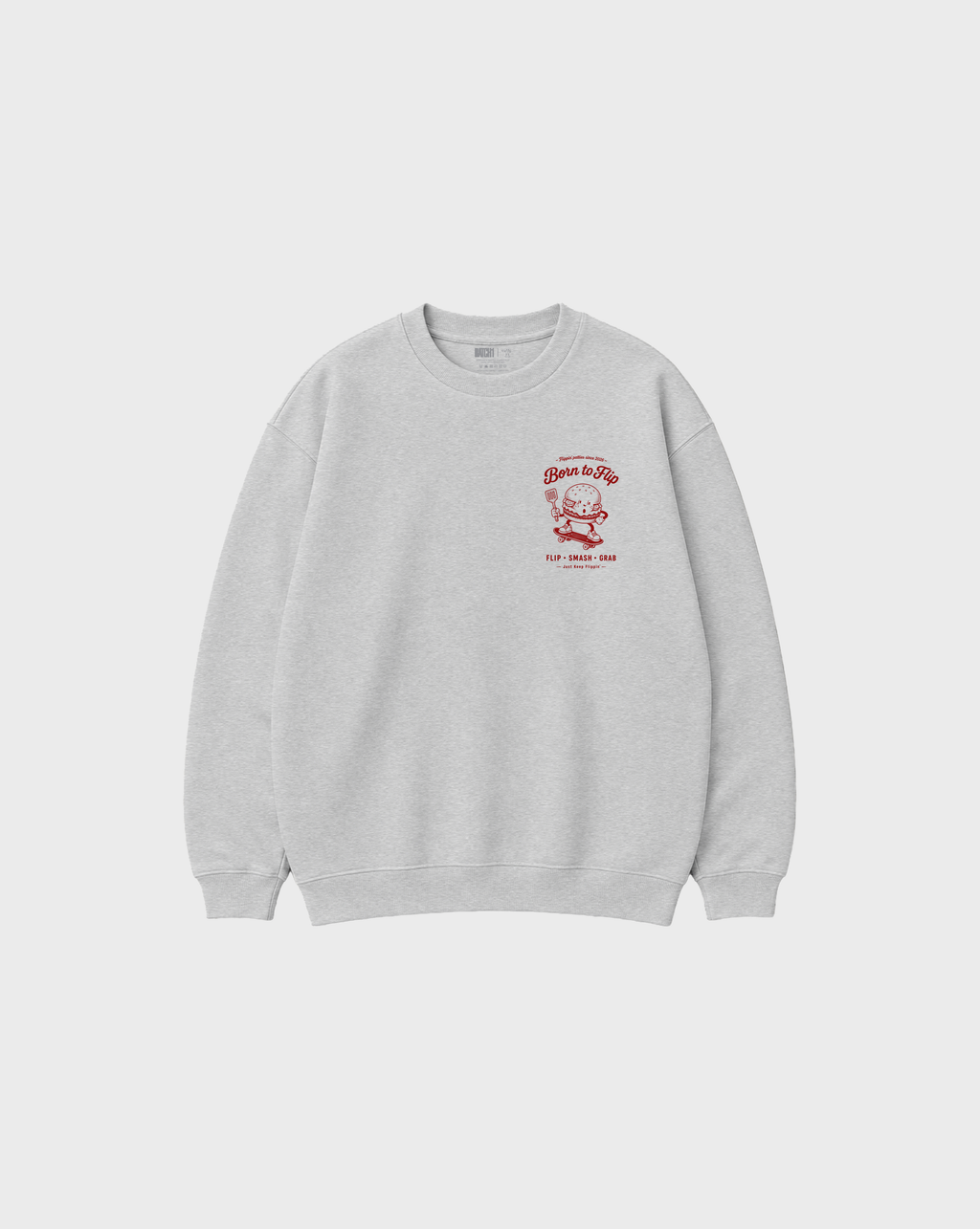 Front flat lay of the Born to Flip ash oversized sweatshirt with deep red burger artwork on the left chest.