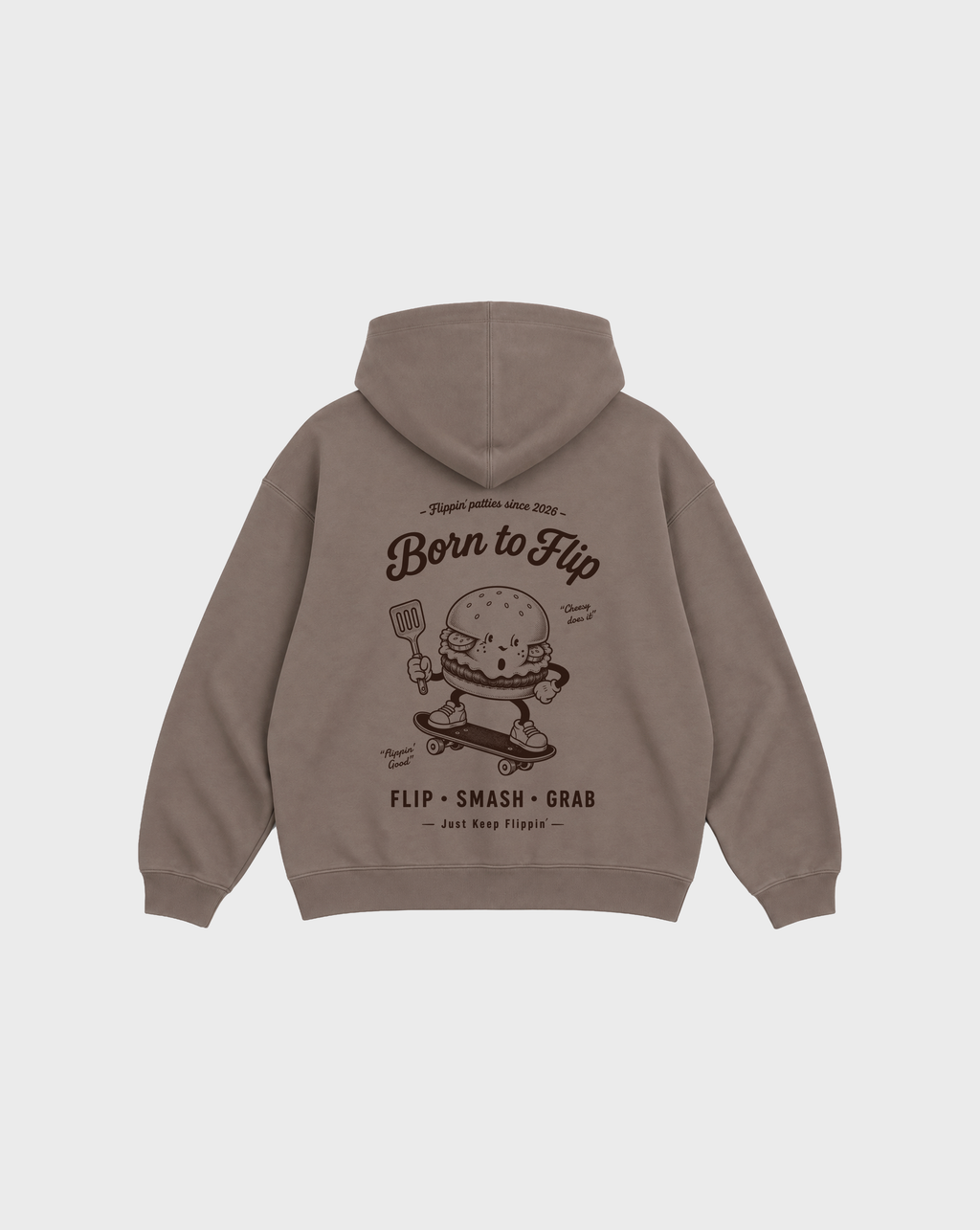 Back flat lay of the Born to Flip taupe oversized hoodie with a large brown skateboarding burger graphic beneath the hood.