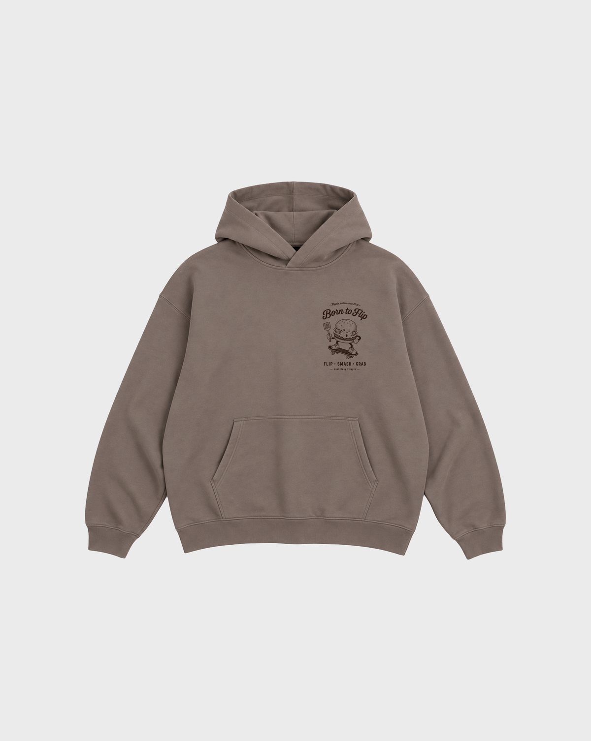 Front flat lay of the Born to Flip taupe oversized hoodie with brown burger artwork on the left chest.