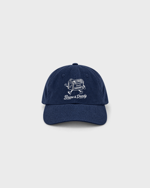 Brine and Dandy Cord Cap in Navy, front view with white sardine-tin character and Brine & Dandy lettering