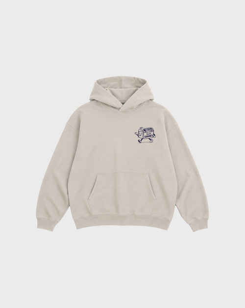 Brine and Dandy stone hoodie, front flat lay, showing a small navy sardine-tin chest print