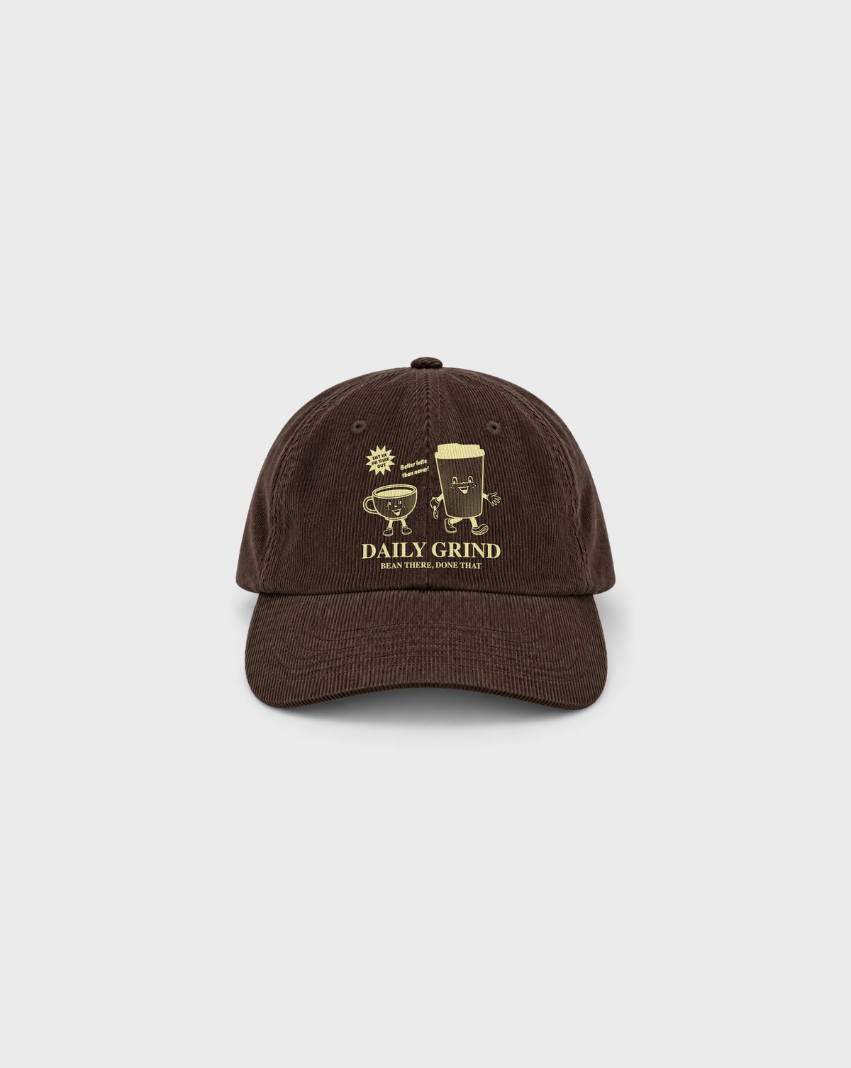 Daily Grind Cord Cap in Brown, front view with pale yellow coffee cup print on natural corduroy.