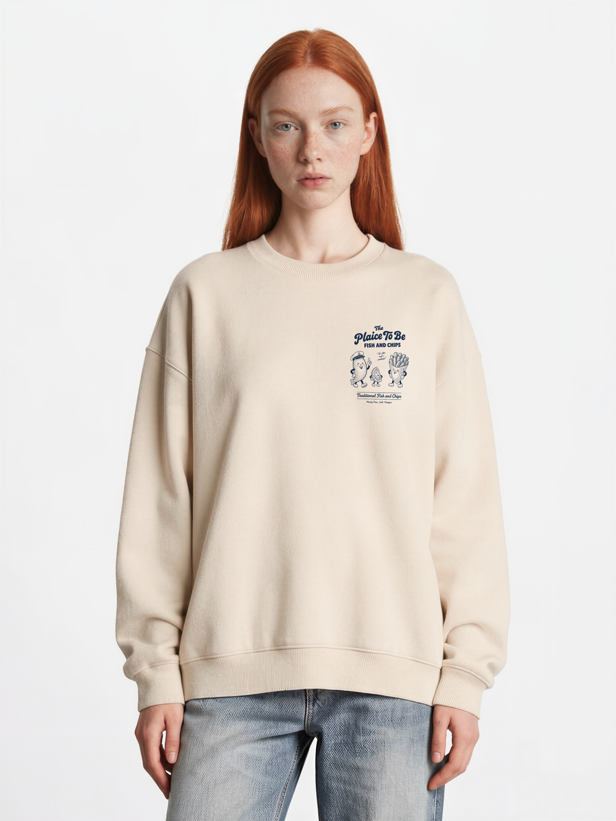 Stone Fish and Chips The Plaice To Be sweatshirt, female model front view with navy small left-chest graphic