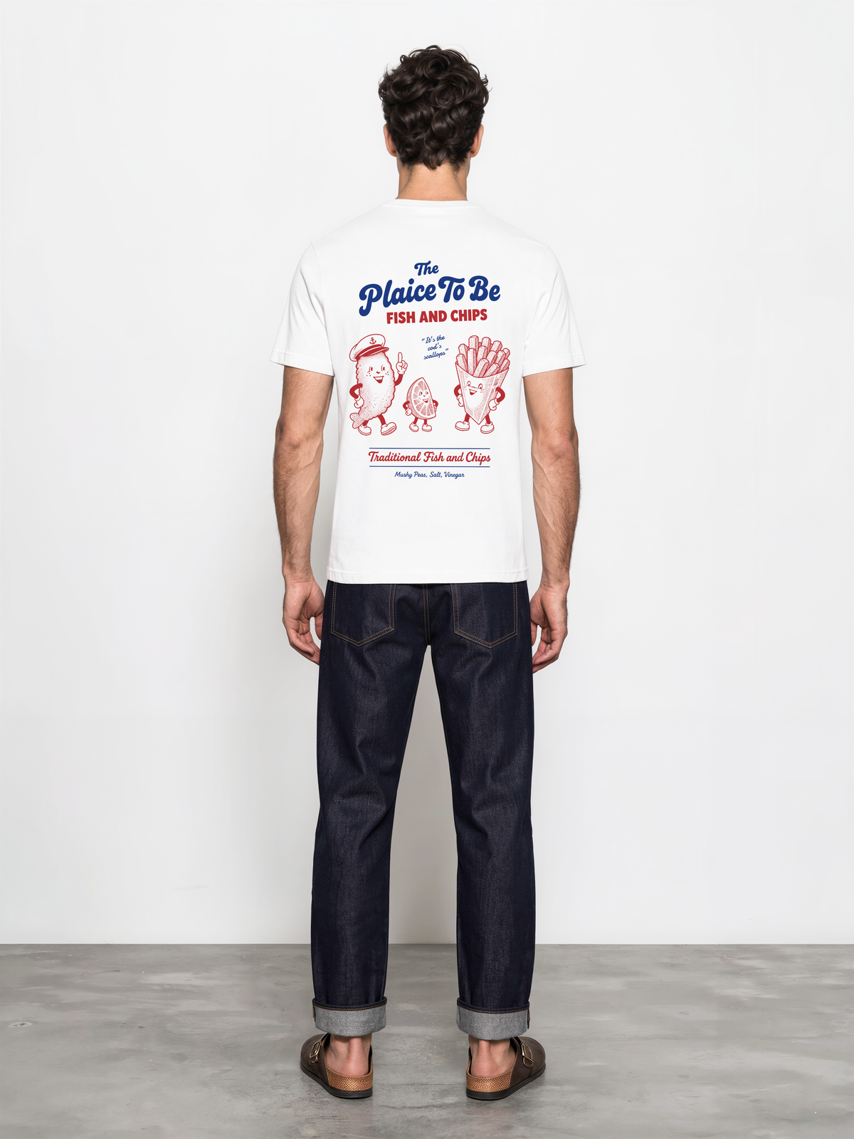 White Fish and Chips The Plaice To Be t-shirt, male model back view with red and blue large back graphic