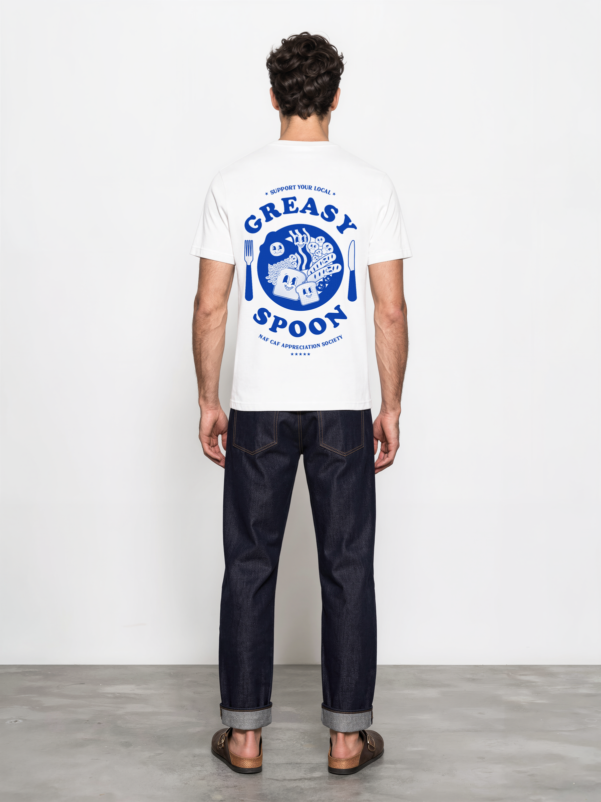 Greasy Spoon white T-shirt, male back model, showing a larger blue Greasy Spoon breakfast graphic across the back