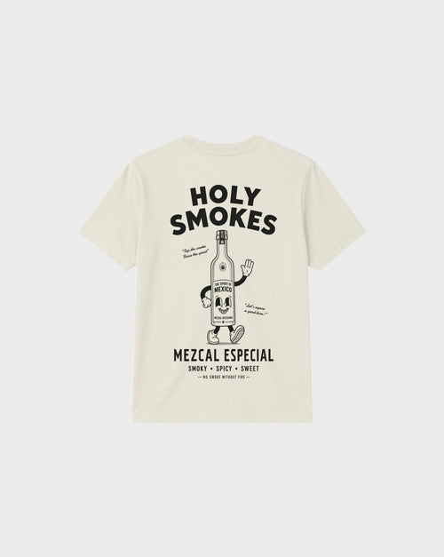 Back flat lay of the ivory Holy Smokes T-shirt with a large black mezcal bottle illustration and Holy Smokes lettering