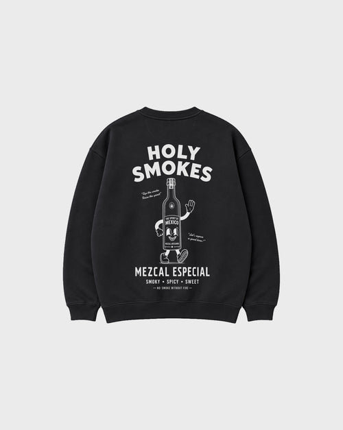 Back flat lay of the black Holy Smokes oversized sweatshirt with a large white mezcal bottle illustration and Holy Smokes lettering