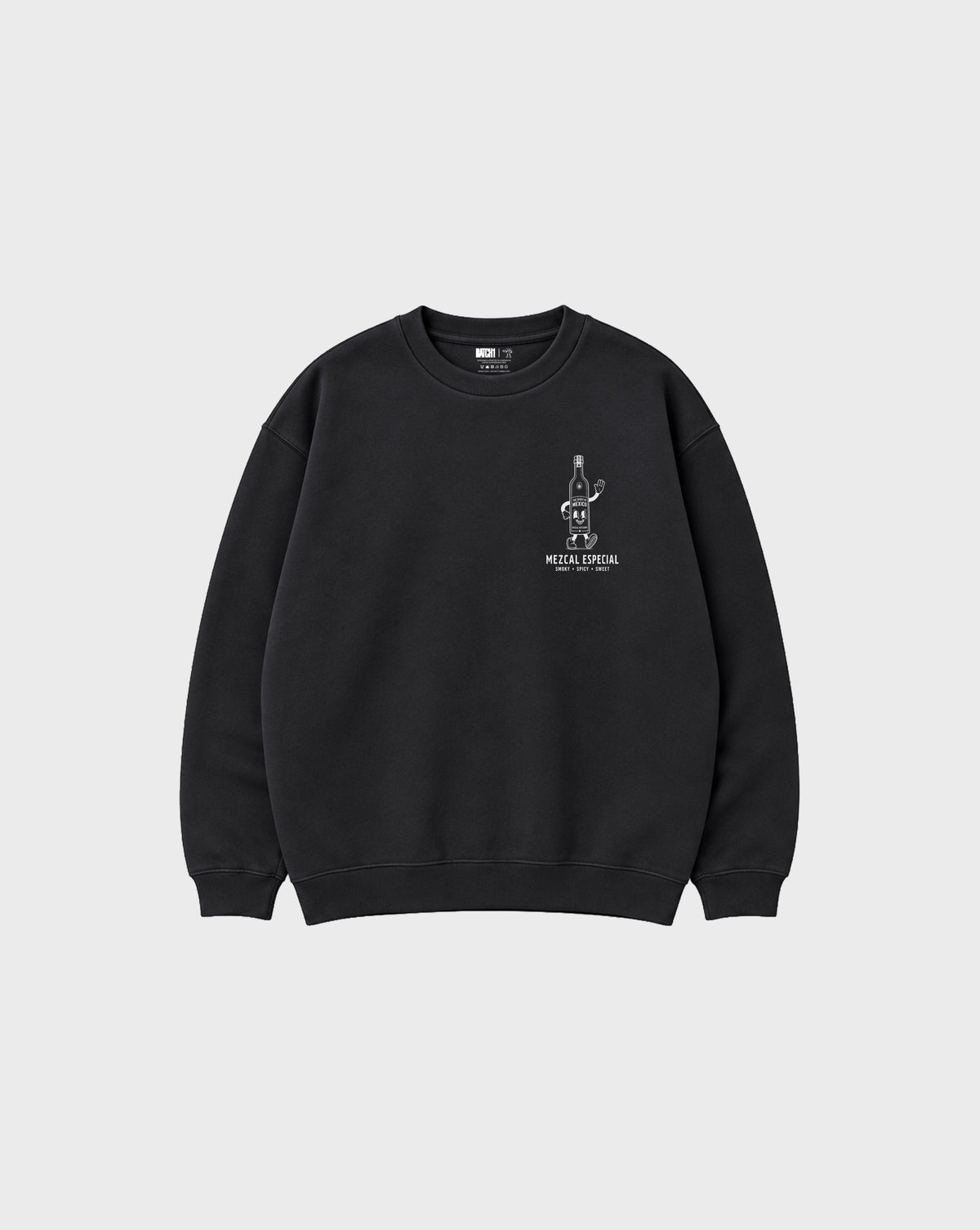 Front flat lay of the black Holy Smokes oversized sweatshirt with a white mezcal bottle graphic on the left chest