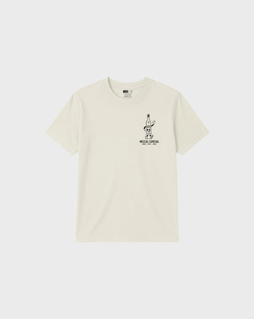 Front flat lay of the ivory Holy Smokes T-shirt with a black mezcal bottle graphic on the left chest
