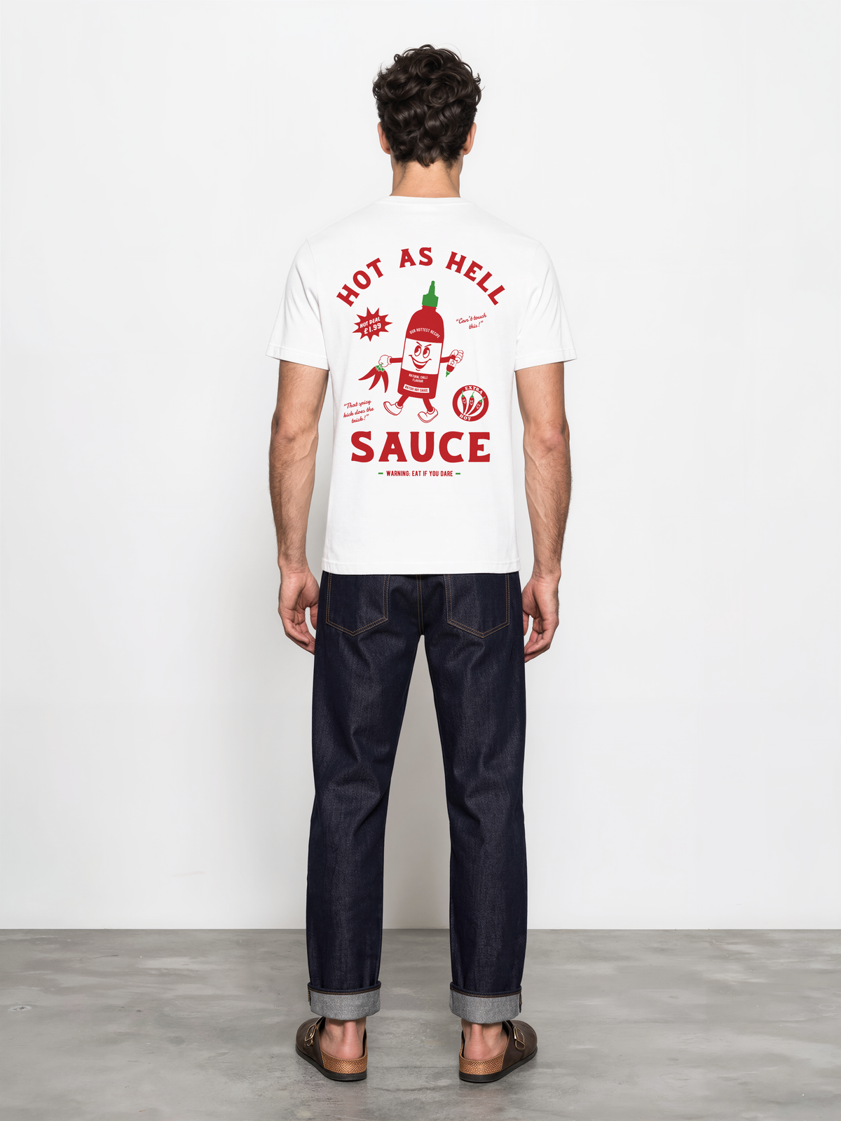Hot Sauce white T-shirt, male back model, showing the larger red and green Hot as Hell Sauce graphic across the back