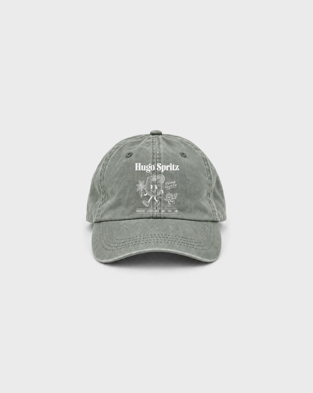 Hugo Spritz Vintage Dad Cap in Washed Sage, front view with white cocktail and elderflower characters, mint, lime and Hugo Spritz lettering