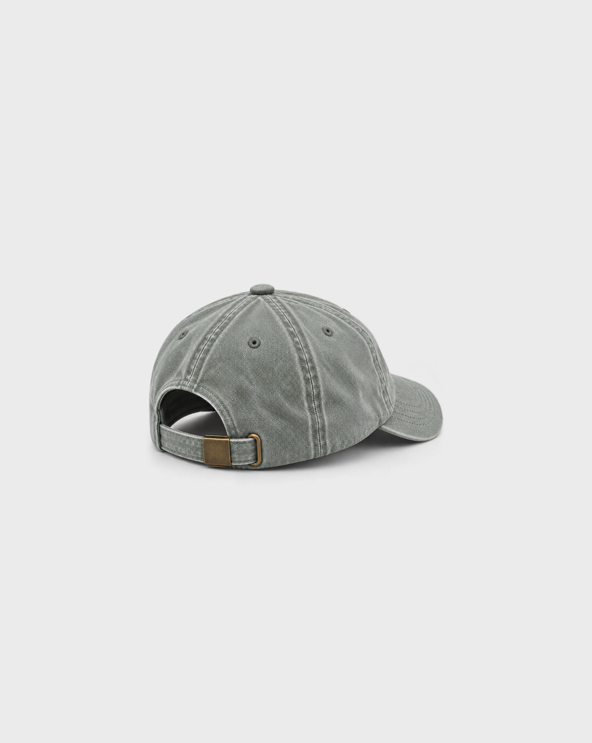Hugo Spritz Vintage Dad Cap in Washed Sage, unprinted side view showing washed cotton, curved peak and adjustable metal buckle