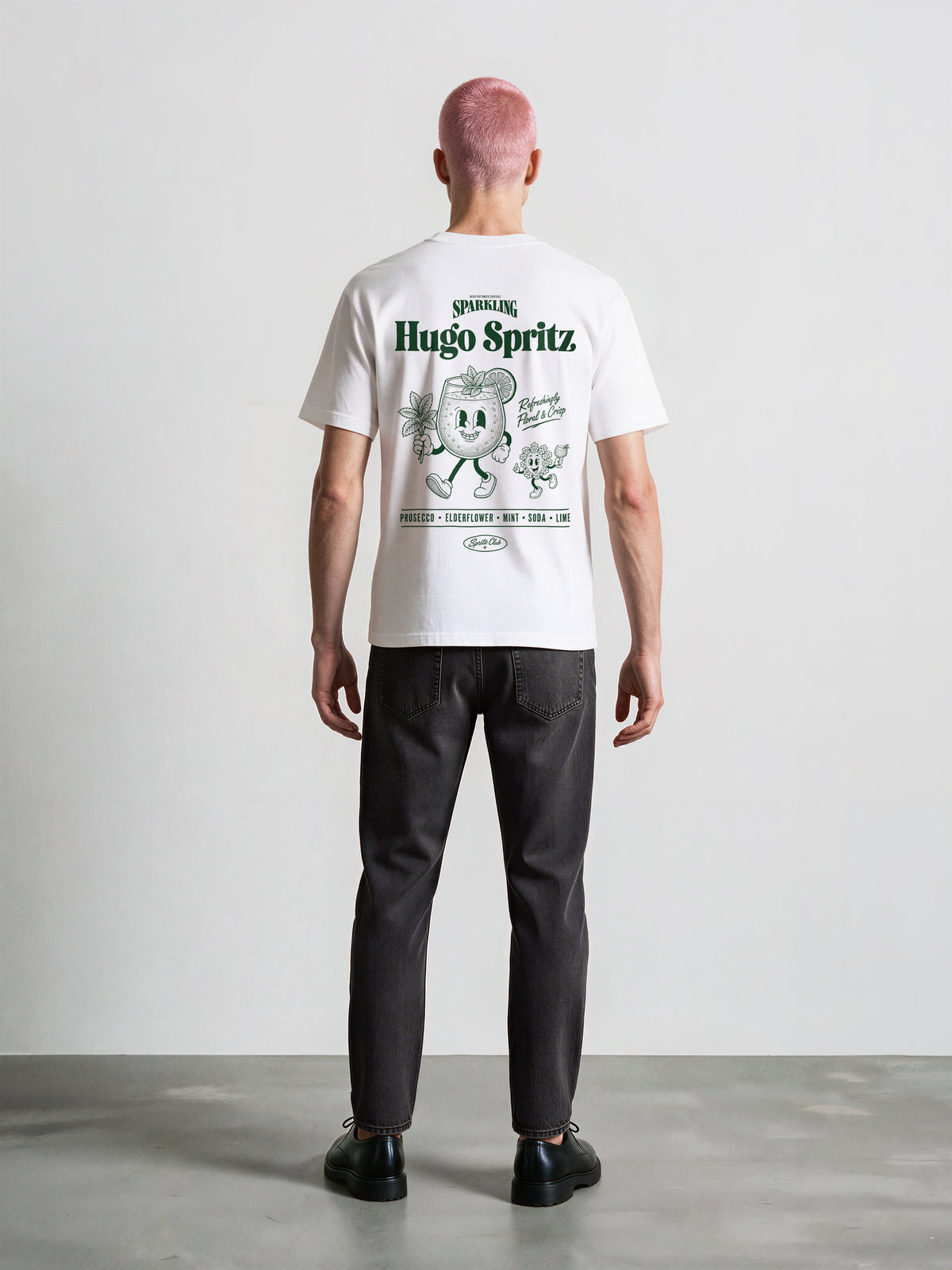 Male model wearing the Hugo Spritz white T-shirt, showing the large green back print