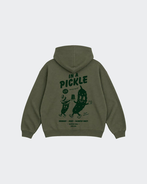 In a Pickle olive oversized unisex hoodie, back with large dark green pickle character graphic