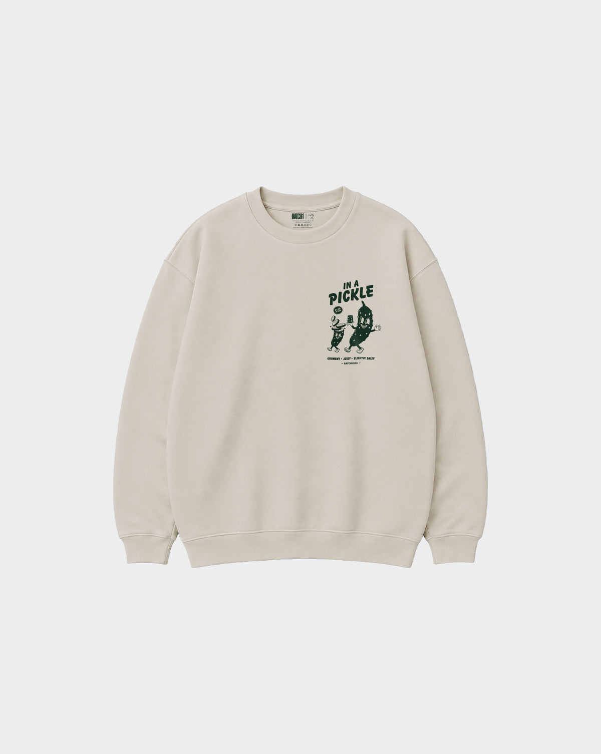 In a Pickle oversized stone sweatshirt, front view with dark green left chest graphic