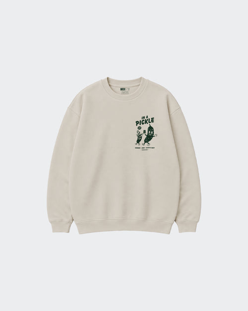 In a Pickle oversized stone sweatshirt, front view with dark green left chest graphic