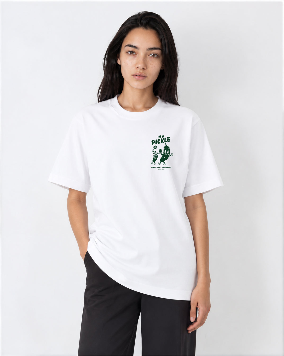 Female model wearing the In a Pickle white T-shirt, front view