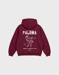 Paloma burgundy oversized hoodie, back flat lay showing the large white cocktail character graphic beneath the hood.