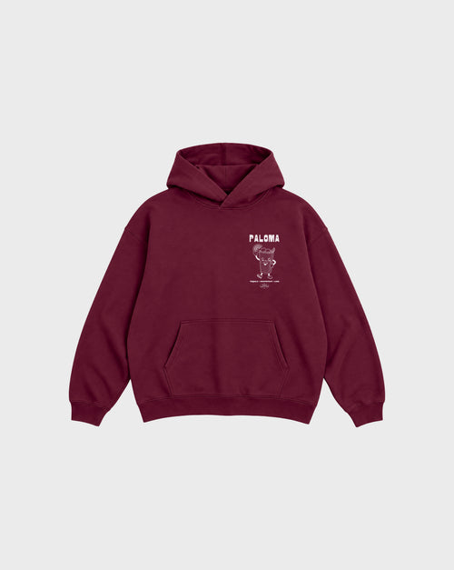 Paloma burgundy oversized unisex hoodie, front flat lay showing the white left-chest cocktail graphic.