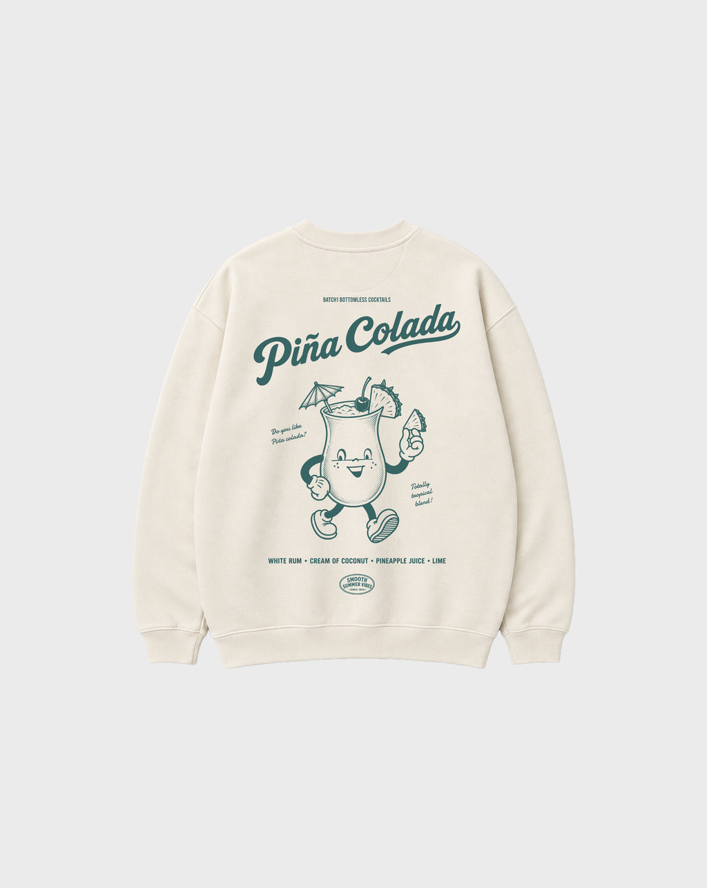 Back flat lay of the Piña Colada ivory oversized sweatshirt, showing the large teal tropical cocktail character and Piña Colada lettering on the back.
