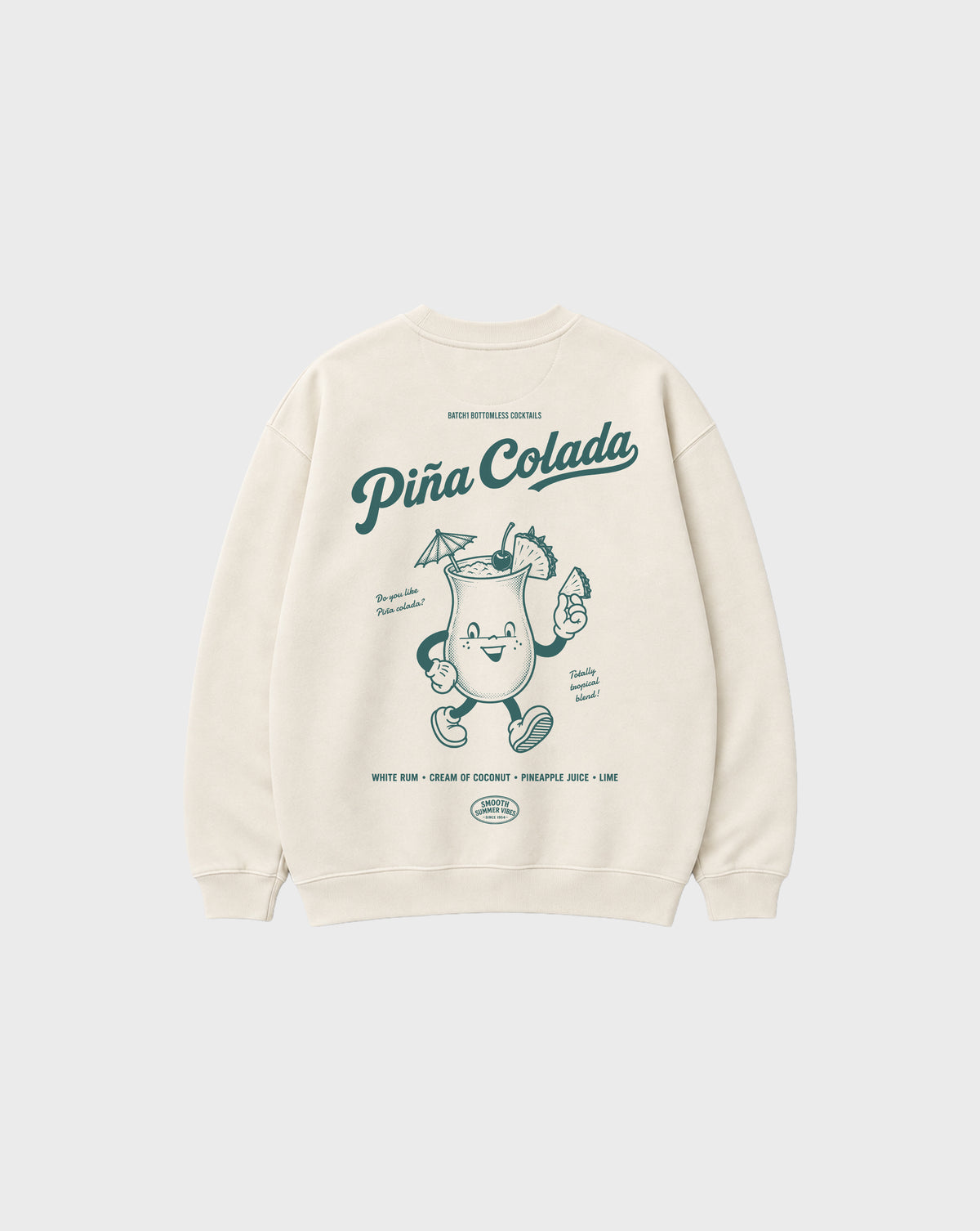 Back flat lay of the Piña Colada ivory oversized sweatshirt, showing the large teal tropical cocktail character and Piña Colada lettering on the back.