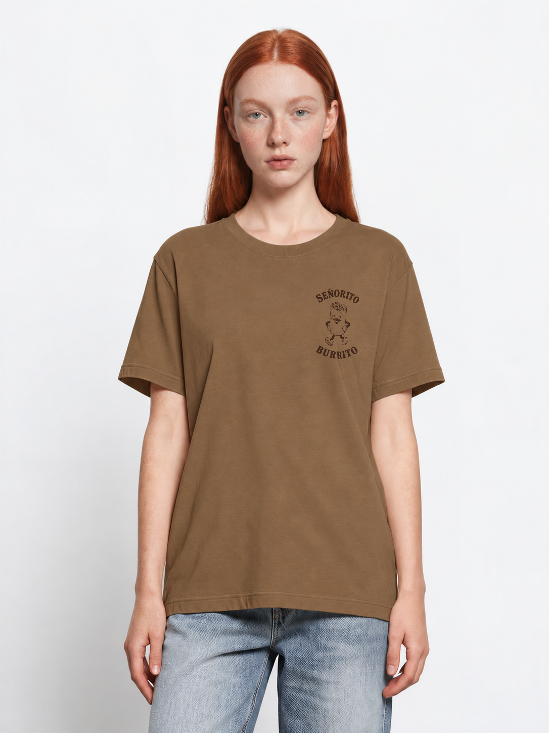 Female model wearing the Señorito Burrito tobacco T-shirt, front view showing the small dark brown burrito artwork on the left chest.