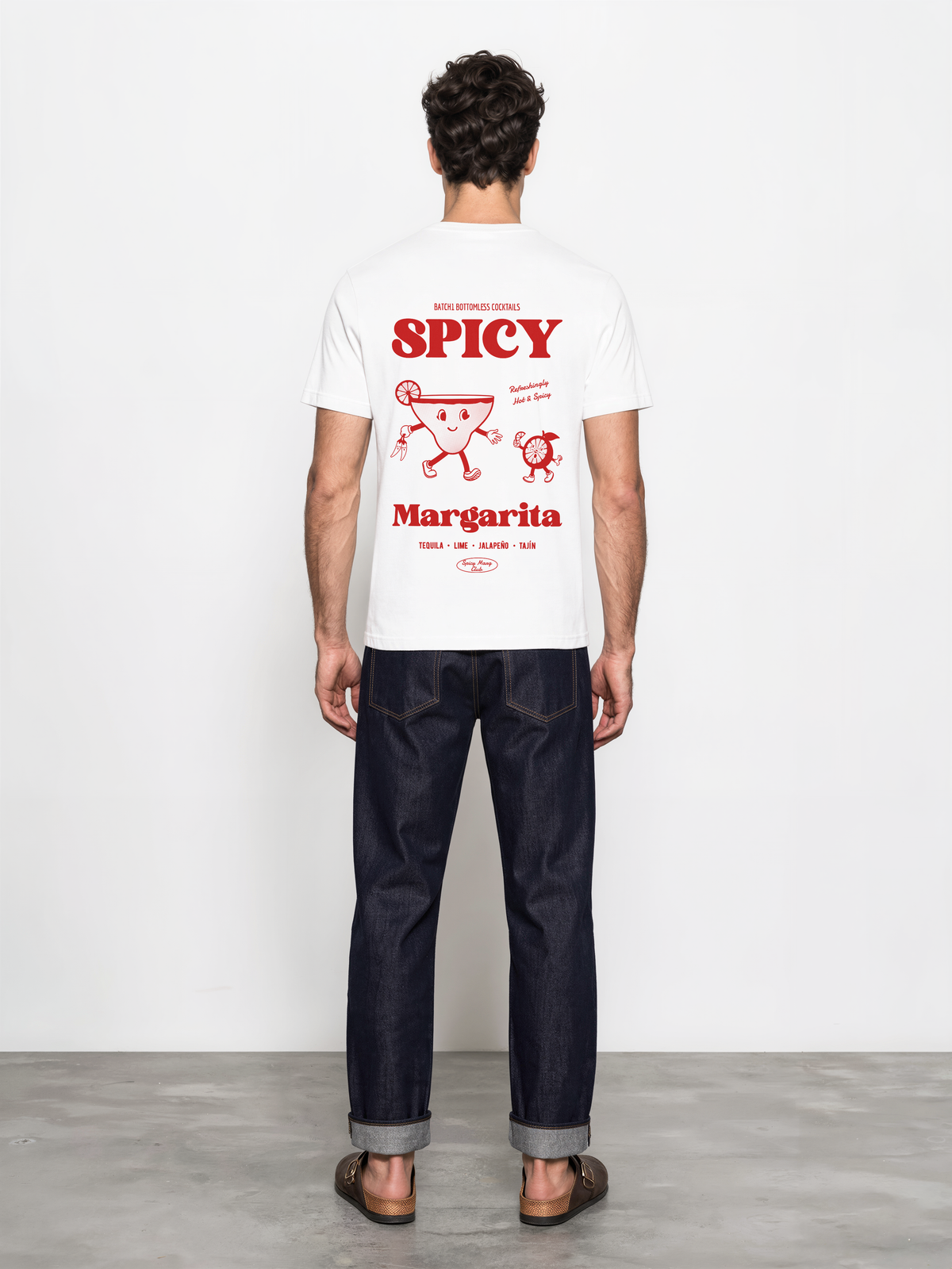 Male model wearing the Spicy Margarita white T-shirt, showing the red cocktail and lettering back print