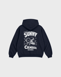 Sunny Camber Sands navy hoodie, back flat lay, showing the larger white seaside sun and steam train back design