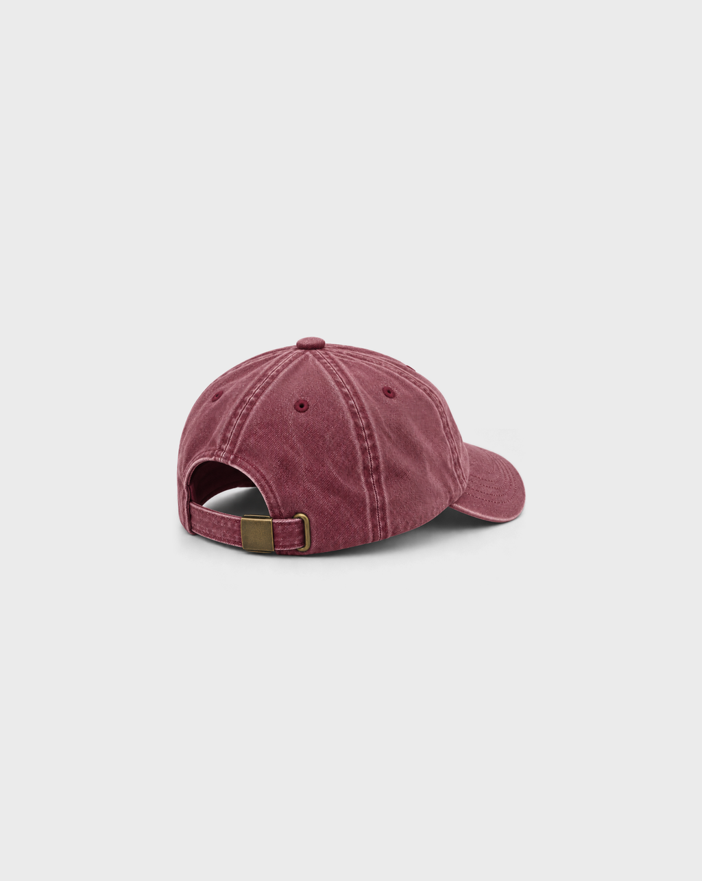 Tiramisu Vintage Dad Cap in Washed Burgundy, unprinted side view showing washed cotton, curved peak and adjustable metal buckle