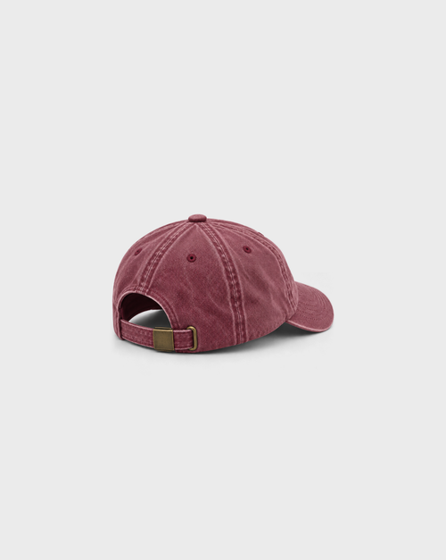 Tiramisu Vintage Dad Cap in Washed Burgundy, unprinted side view showing washed cotton, curved peak and adjustable metal buckle