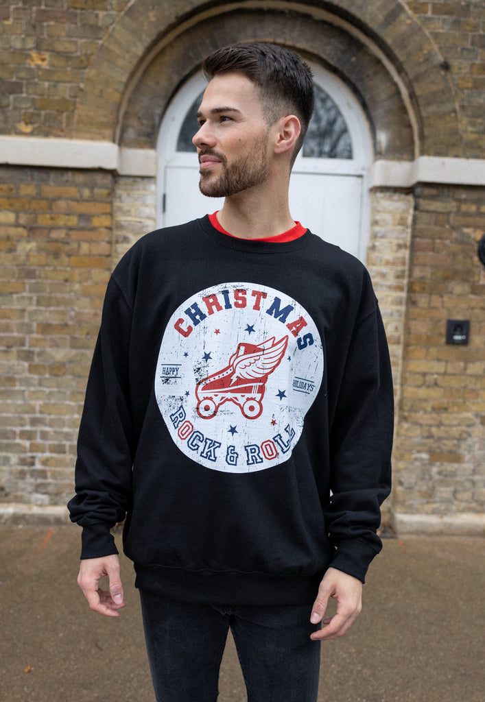 christmas sweater with red white and blue roller skate logo
