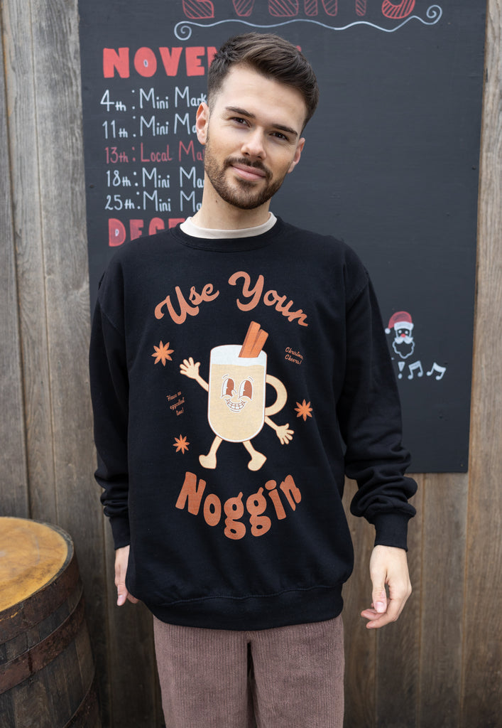 mens christmas sweater with use your noggin slogan and egg nog graphic