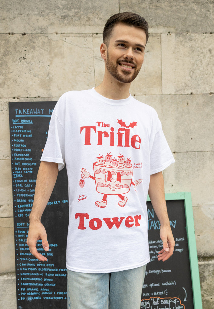 male model wears christmas t shirt with trifle theme slogan and character