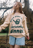 womens christmas jumper in natural with festive gardening slogan 