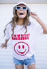 Model wears white tshirt with Jammin happy face biscuit graphic
