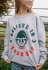 womens printed christmas jumper with vintage elf and positive slogan
