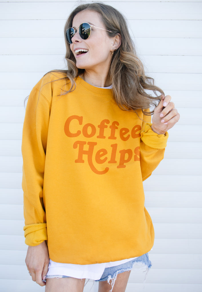 Model wears eco friendly logo printed jumper